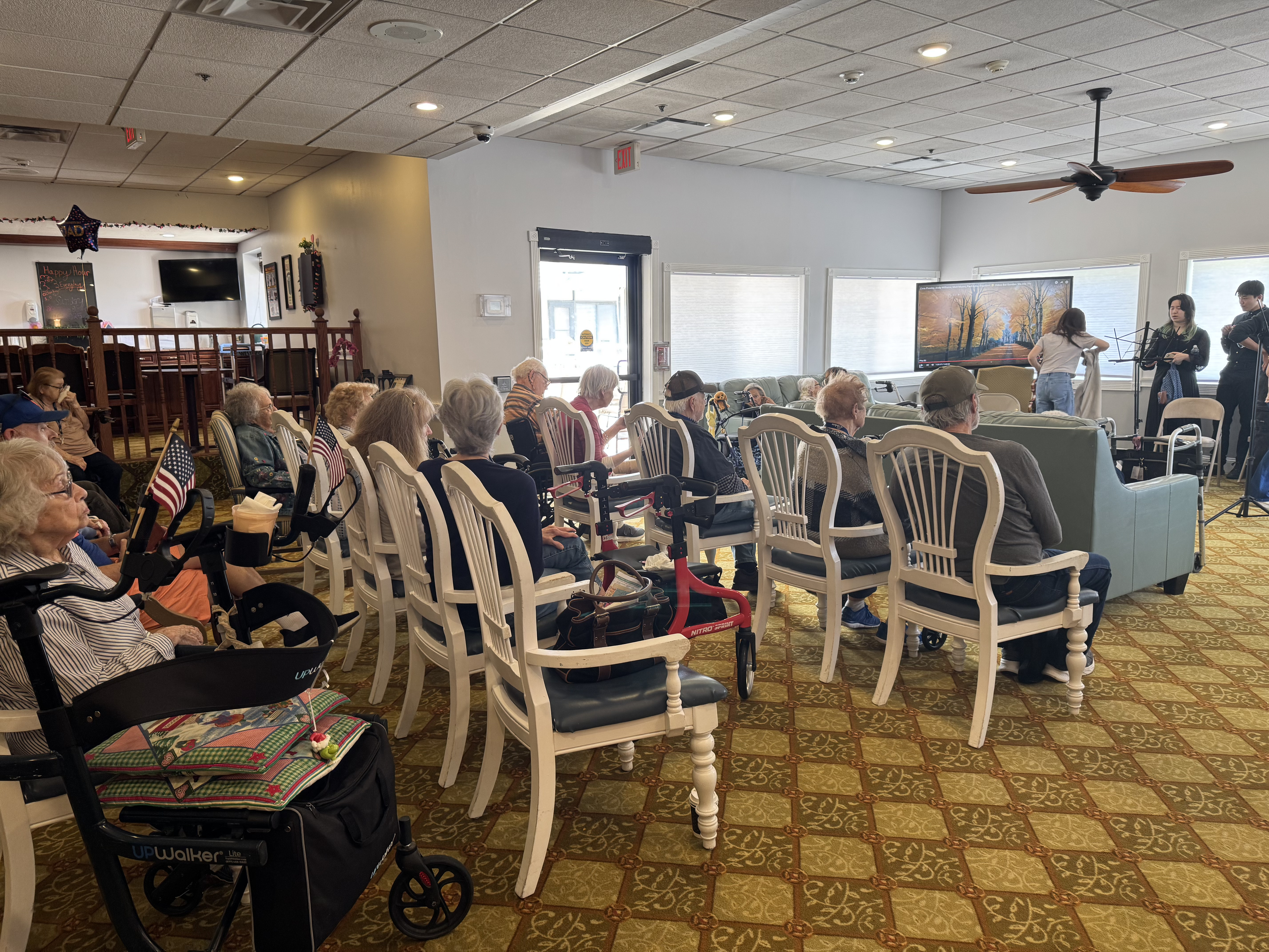 Volunteers engaging with elderly members